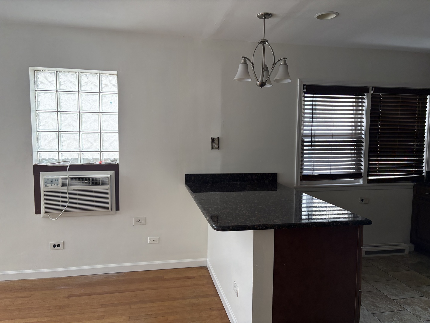 751 North Northwest Highway Park Ridge, IL 60068 - Photo 16 of 25 a blue kitchen with a refrigerator and a stove top oven