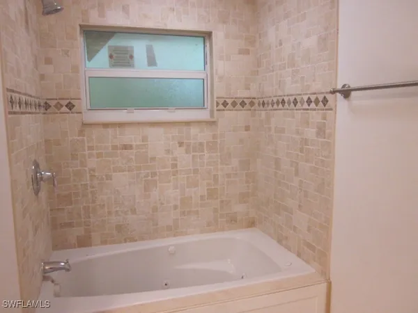 a bathroom with a bathtub