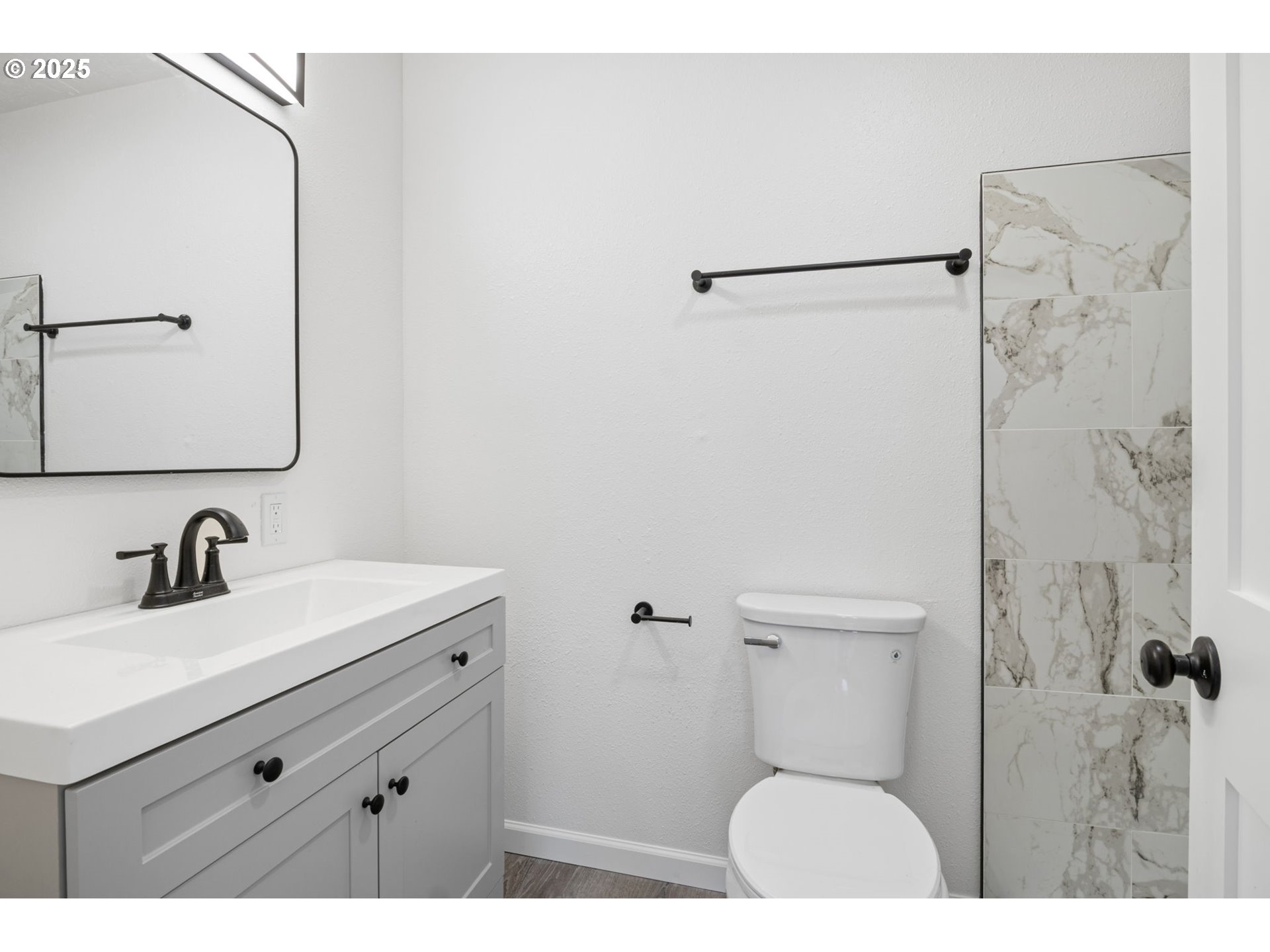 514 East 2nd Avenue Riddle, OR 97469 - Photo 14 of 16 a bathroom with a sink a toilet and shower