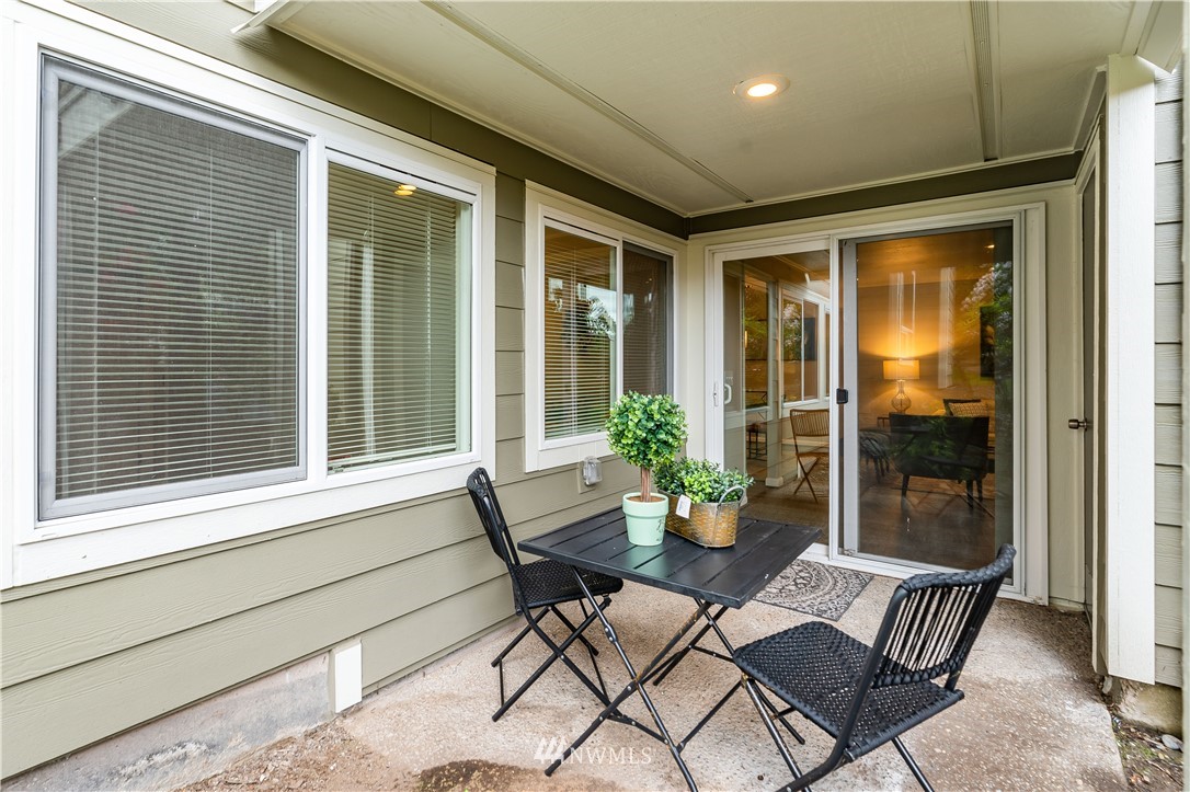 7579 Old Redmond Road, Unit 4 Redmond, WA 98052 - Photo 20 of 21 a outdoor living space with furniture and a potted plant