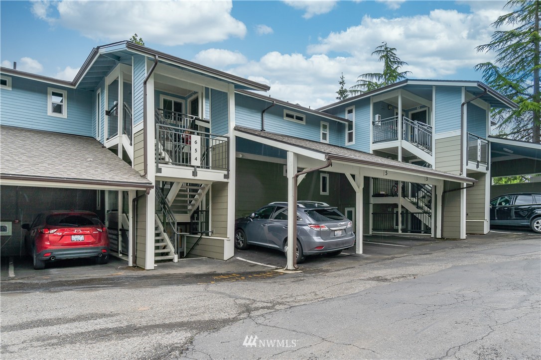 7579 Old Redmond Road, Unit 4 Redmond, WA 98052 - Photo 21 of 21 a view of a car park in front of house