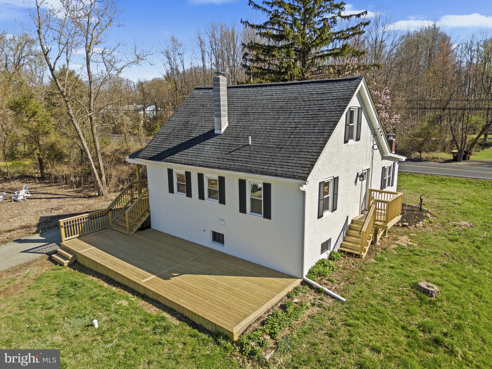 2042 Upper Ridge Road Green Lane, PA 18054 - Photo 34 of 41 Back Exterior with New Deck