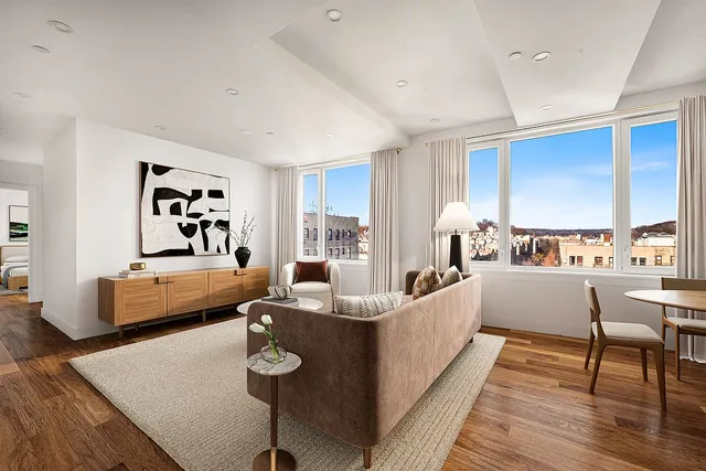 a kitchen with stainless steel appliances granite countertop a refrigerator sink and stove