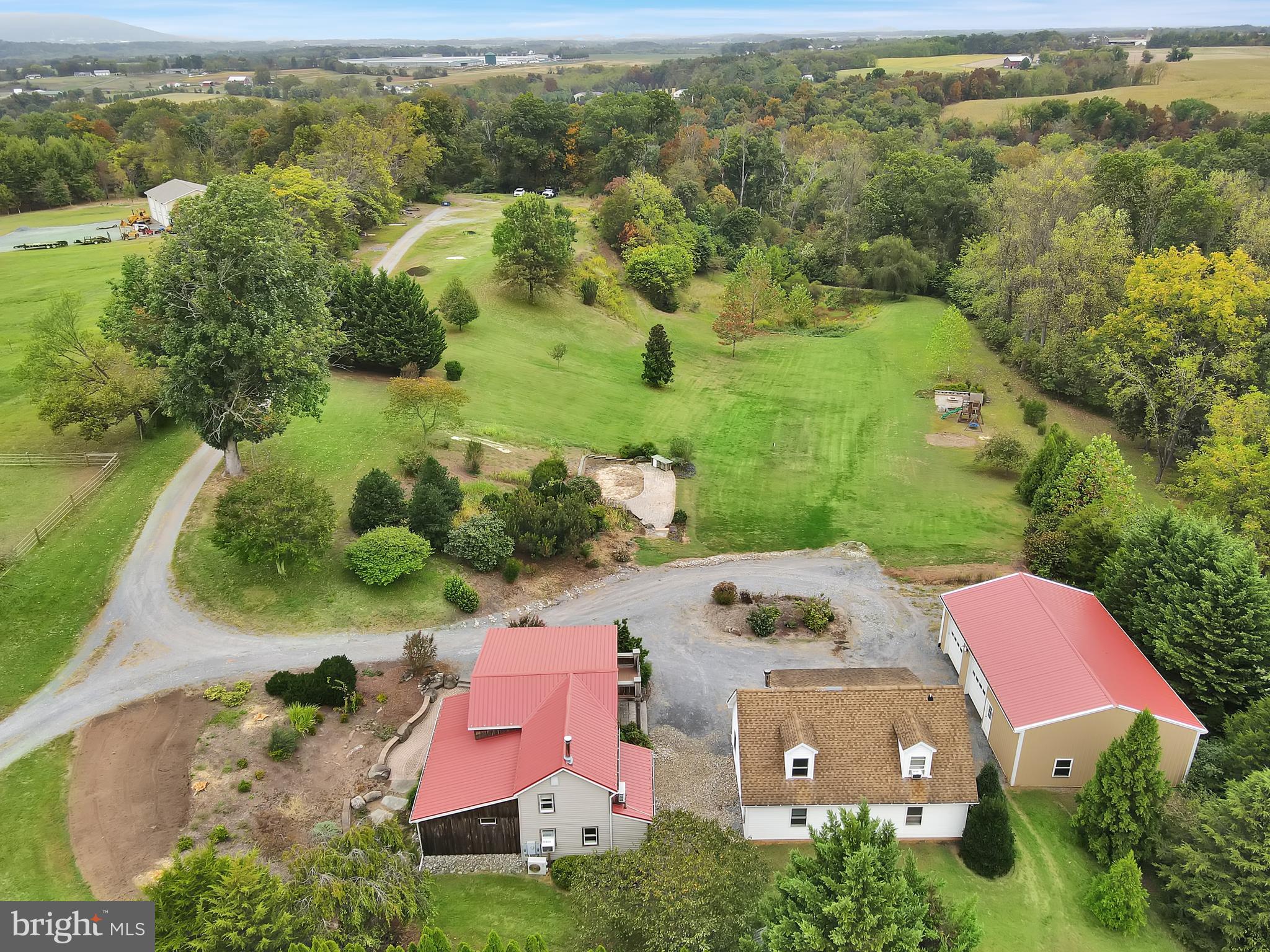 an aerial view of a house with a garden