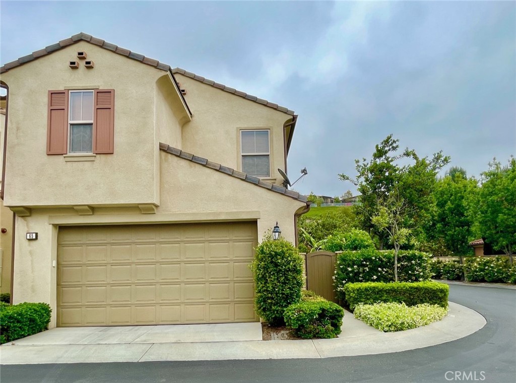 65 Sacred Path Irvine, CA 92618 - Photo 2 of 22 a view of front of house