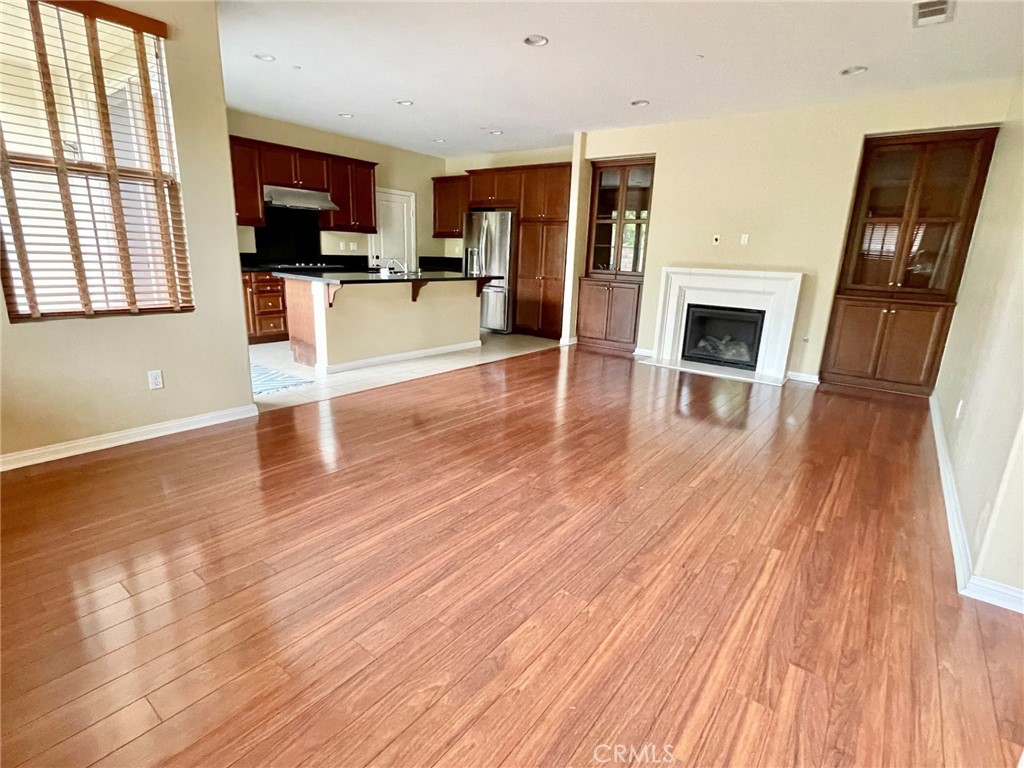 65 Sacred Path Irvine, CA 92618 - Photo 3 of 22 a view of a livingroom with furniture and a flat screen tv