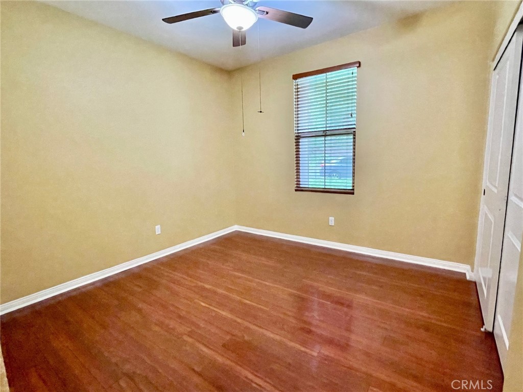 65 Sacred Path Irvine, CA 92618 - Photo 9 of 22 wooden floor in an empty room with a window