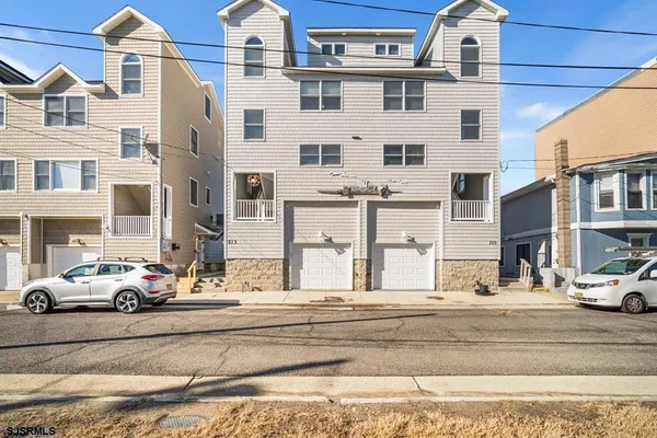 a view of a street with a building in the background