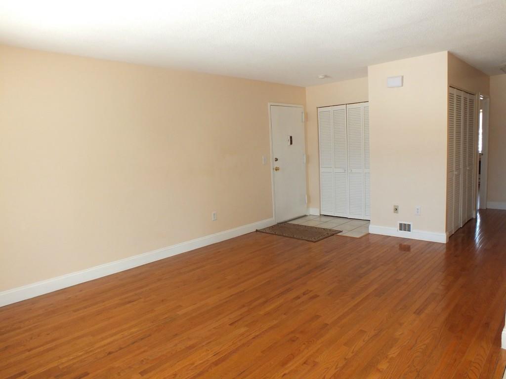 93 Kent Court, Unit 93 Meriden, CT 06450 - Photo 12 of 27 a view of empty room with wooden floor