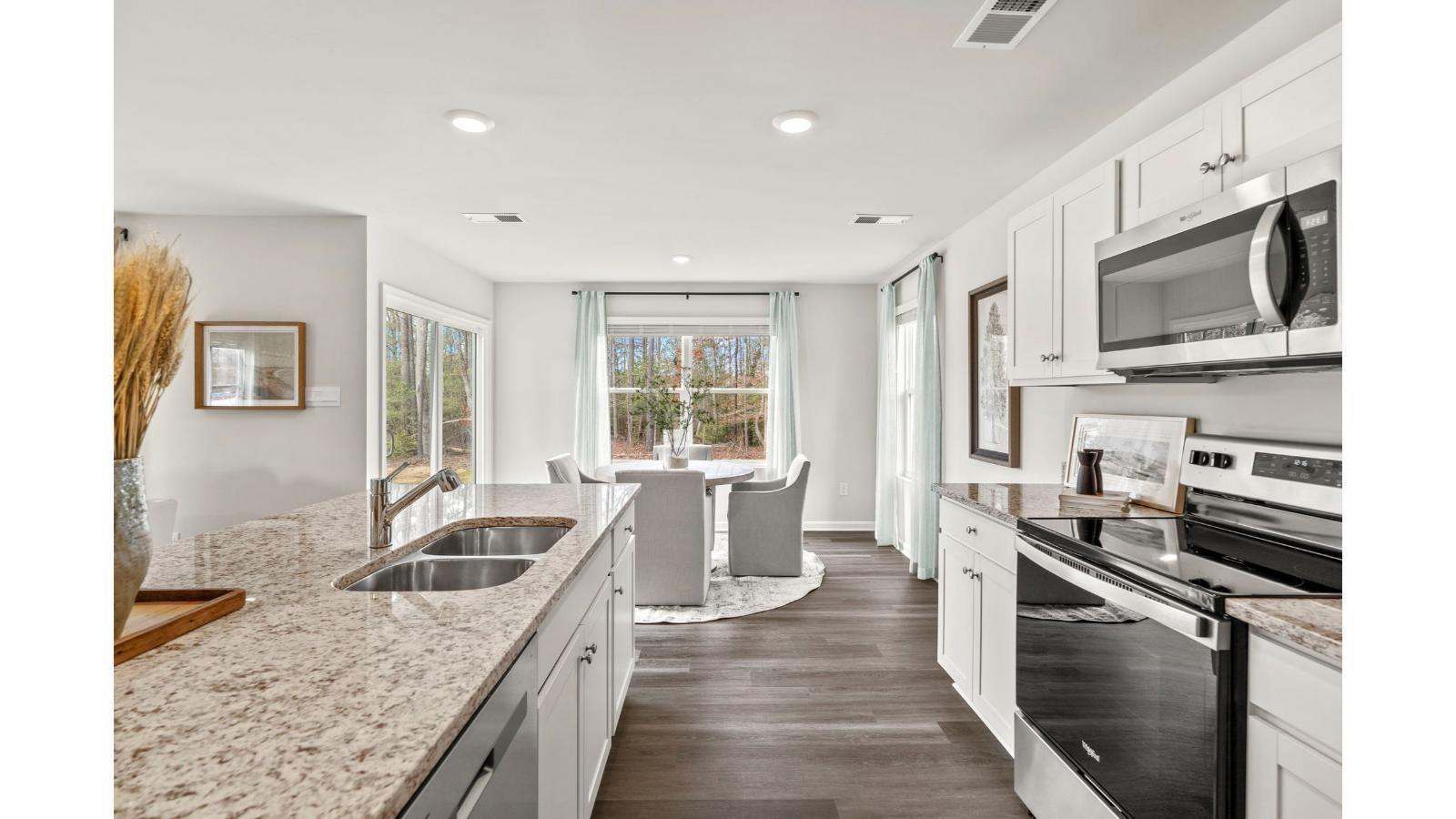 27 George William Lane Lexington, VA 24450 - Photo 11 of 22 a kitchen with stainless steel appliances granite countertop a sink stove and refrigerator