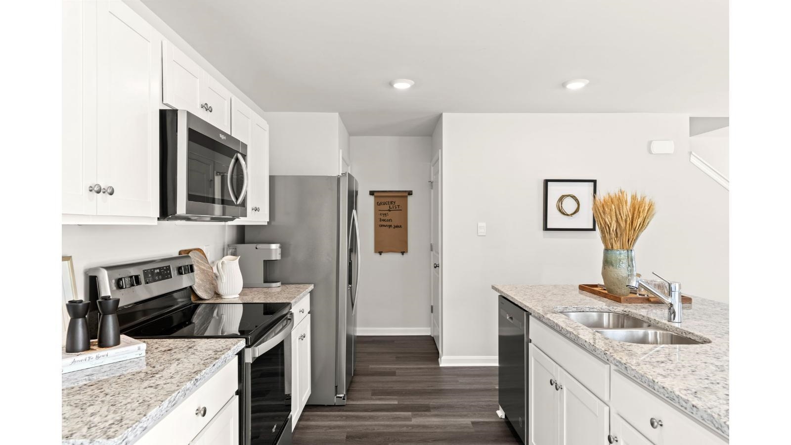 27 George William Lane Lexington, VA 24450 - Photo 7 of 22 a kitchen with stainless steel appliances granite countertop a sink stove and refrigerator
