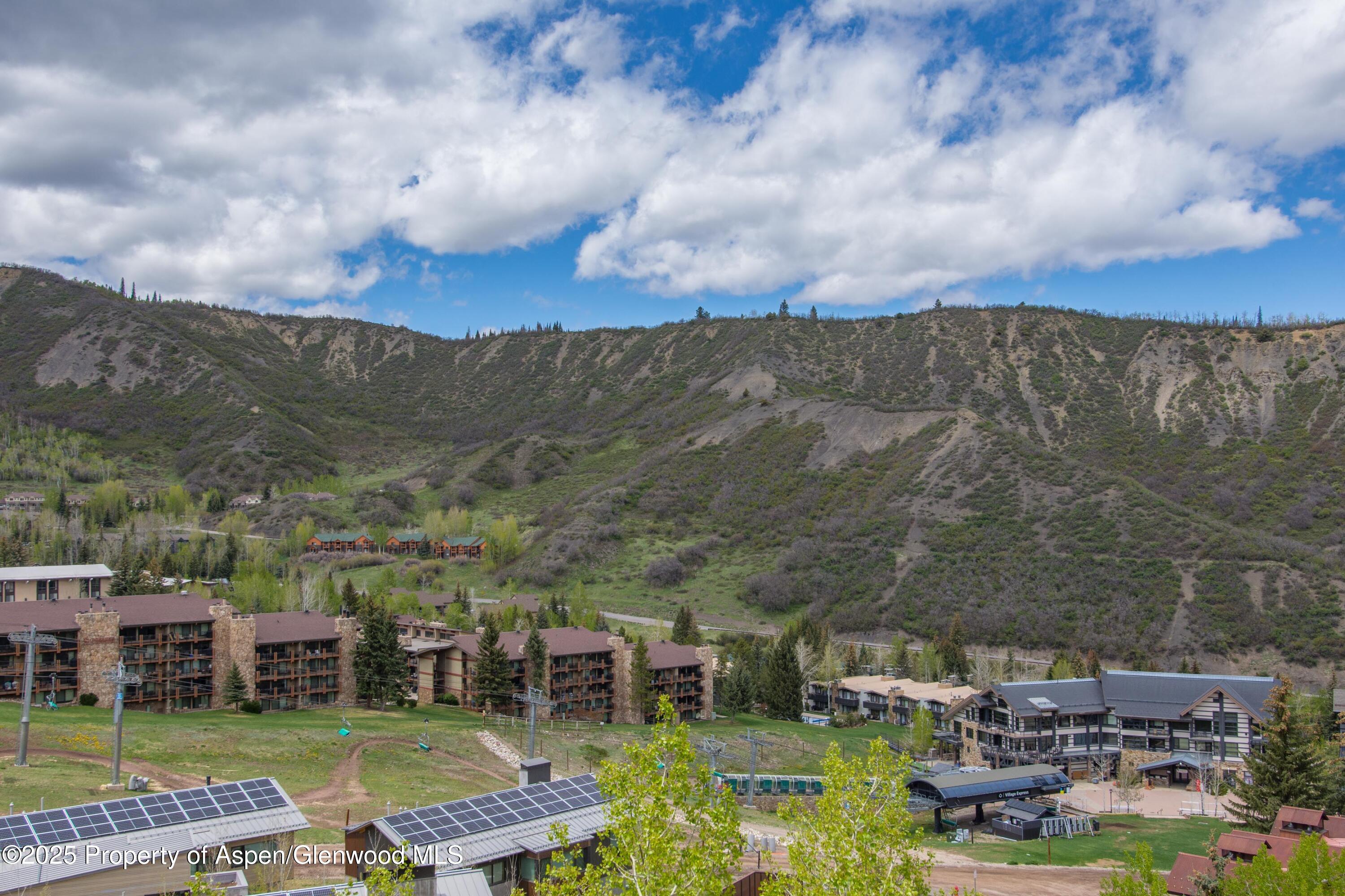 425 Wood Road, Unit 48 Snowmass Village, CO 81615 - Photo 10 of 39 an aerial view of a house with garden space