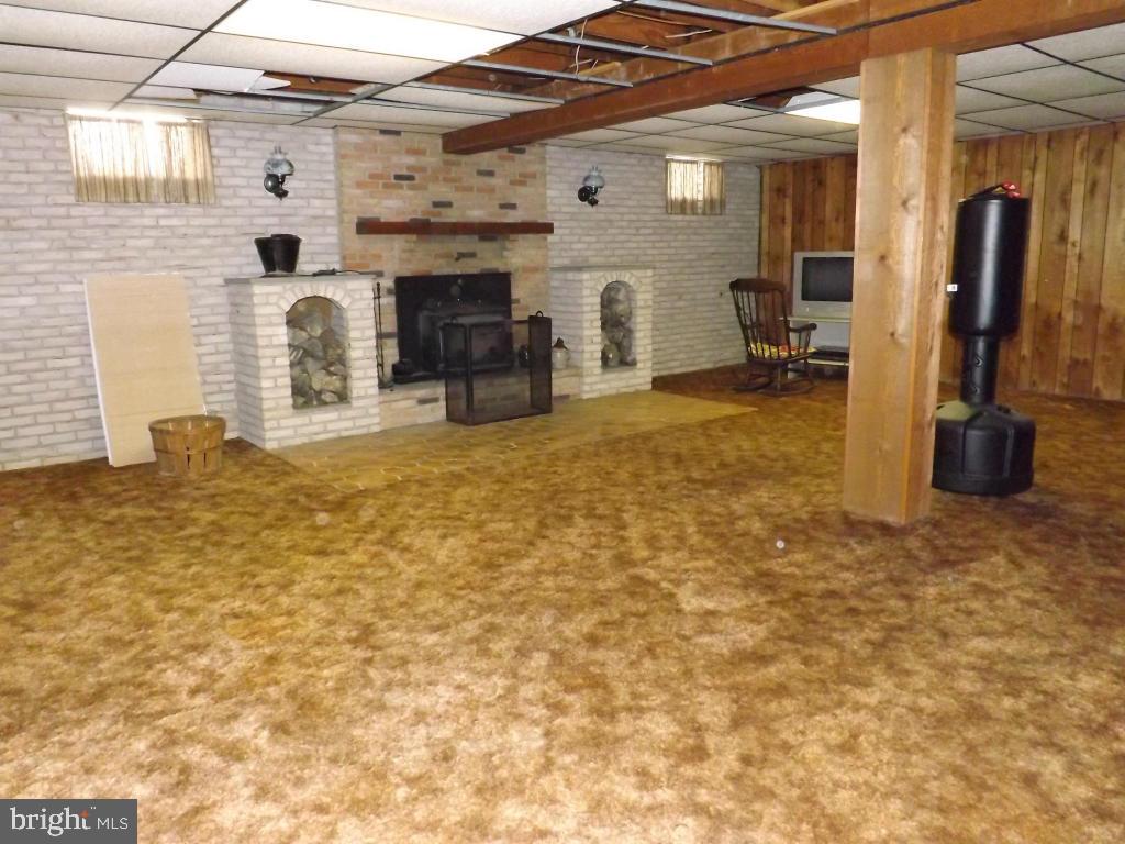 624 Snyder Road Lititz, PA 17543 - Photo 19 of 26 a view of a livingroom with furniture and a flat screen tv