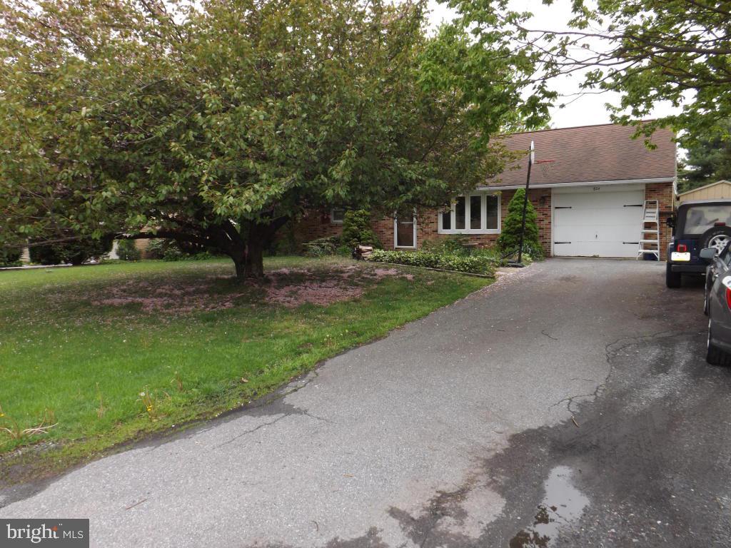 624 Snyder Road Lititz, PA 17543 - Photo 3 of 26 a view of a house with a yard and tree s