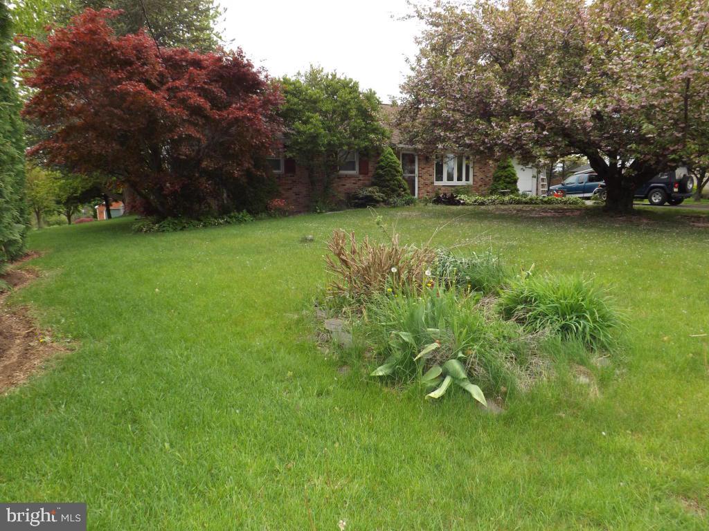 624 Snyder Road Lititz, PA 17543 - Photo 5 of 26 a view of a field of grass and trees