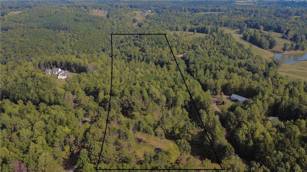 744 Moores Gin Road Fairmount, GA 30139 - Photo 2 of 5 an aerial view of a houses with a yard