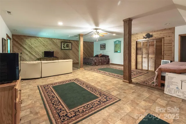 a view of balcony with wooden floor and outdoor seating
