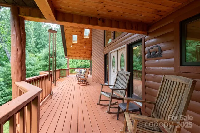 a view of balcony with furniture