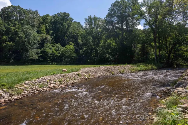 a view of a golf course with a big yard