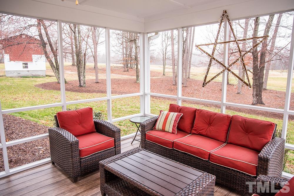 4540 Semora Road Roxboro, NC 27574 - Photo 3 of 58 a living room with furniture and a large window