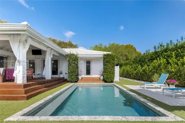 a view of a house with a swimming pool