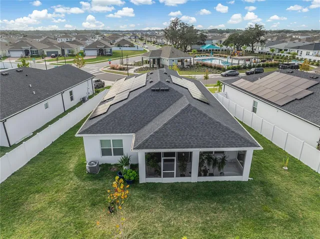 a view of a house with a ocean view