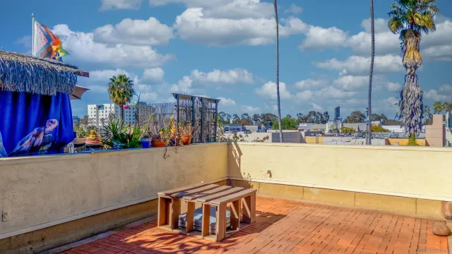 a view of a swimming pool with sitting area