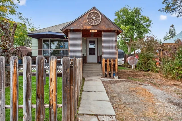 a front view of a house with a porch