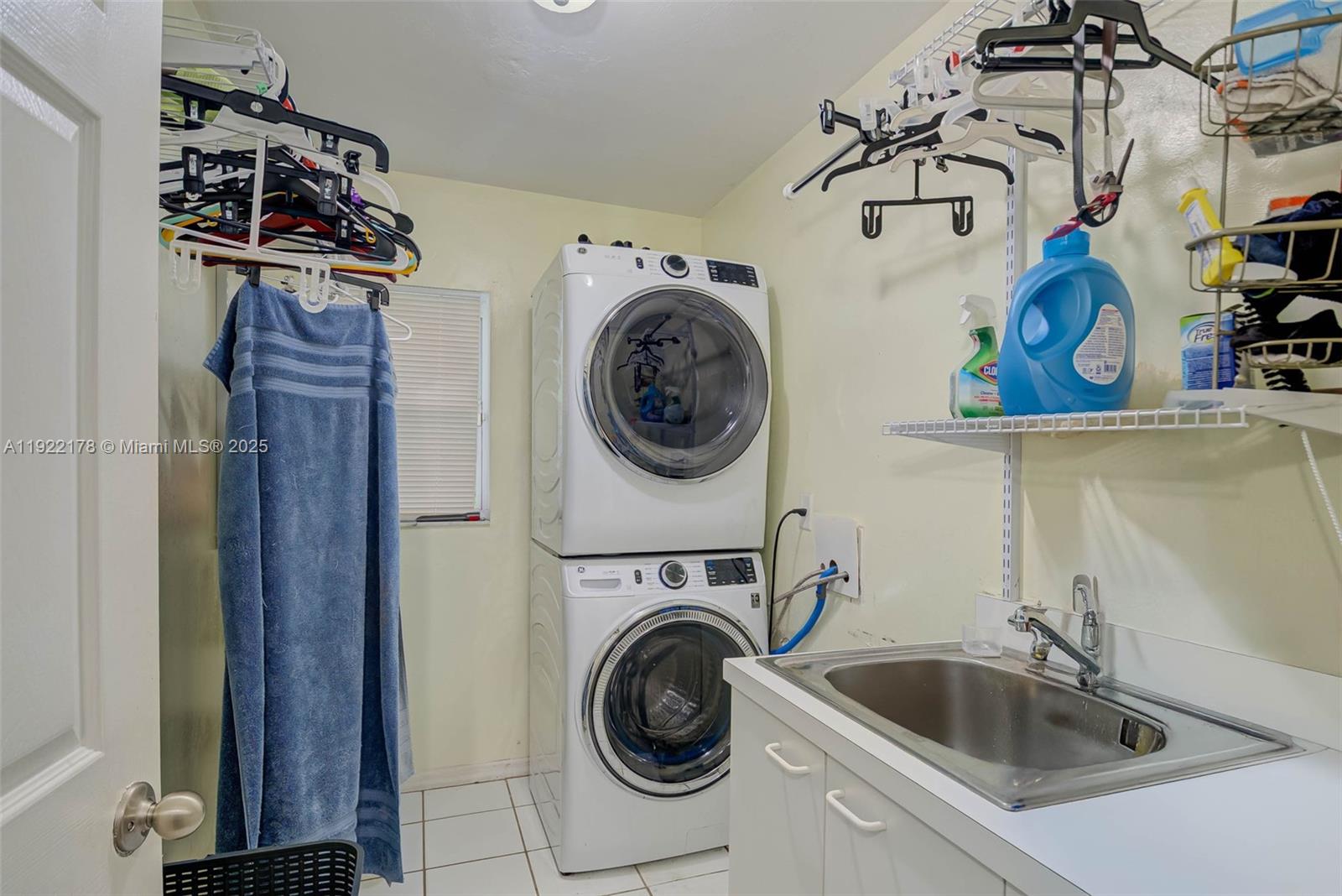 530 7th Street Southwest Naples, FL 34117 - Photo 20 of 32 a utility room with sink dryer and washer
