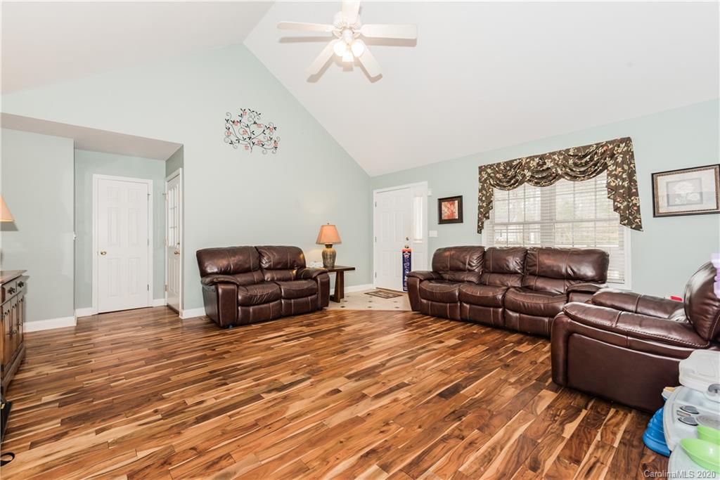 3130 Bush Road Clover, SC 29710 - Photo 3 of 25 a living room with furniture and a wooden floor