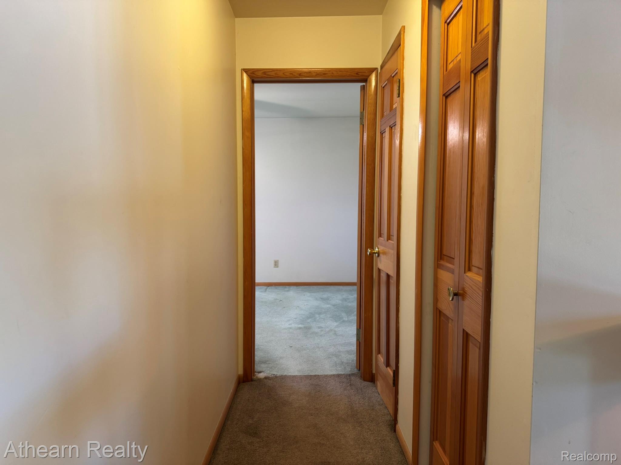 11449 Torrey Road Fenton, MI 48430 - Photo 23 of 30 Wood-finish doors with brass hardware