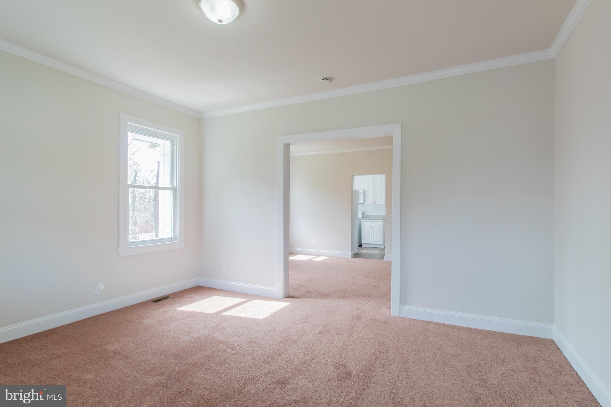 9440 Riggs Road Adelphi, MD 20783 - Photo 11 of 18 a view of a room that has a window in it