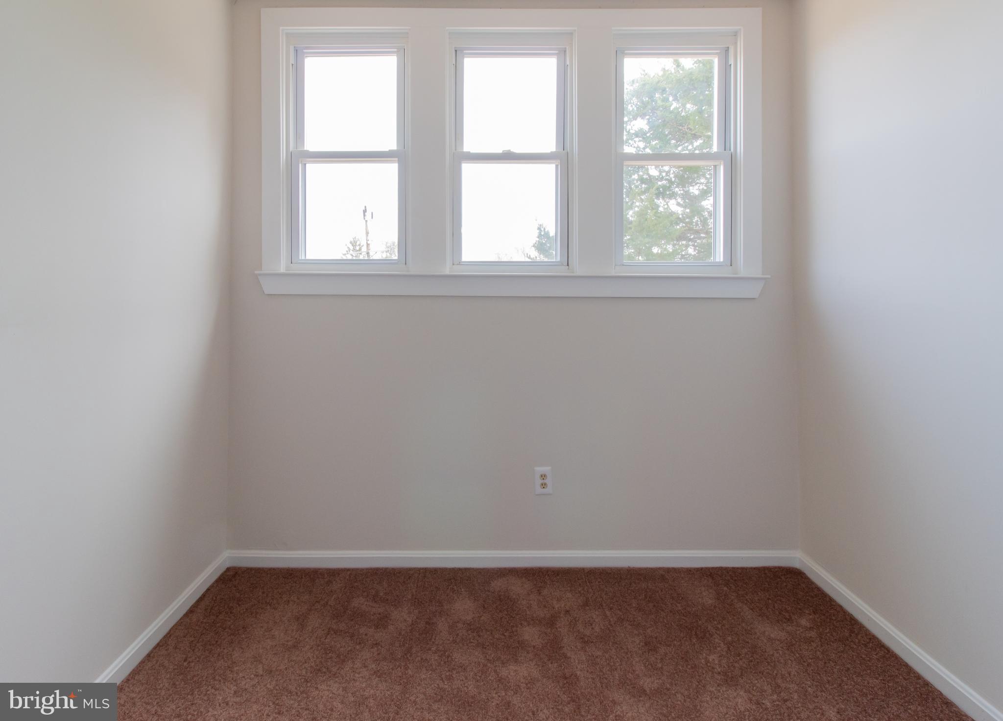 9440 Riggs Road Adelphi, MD 20783 - Photo 17 of 18 an empty room with a window