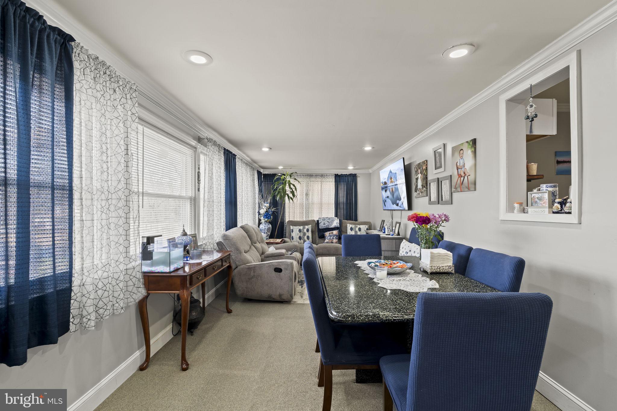 3105 Newportville Road Bristol, PA 19007 - Photo 13 of 30 a living room with fireplace furniture and a large window
