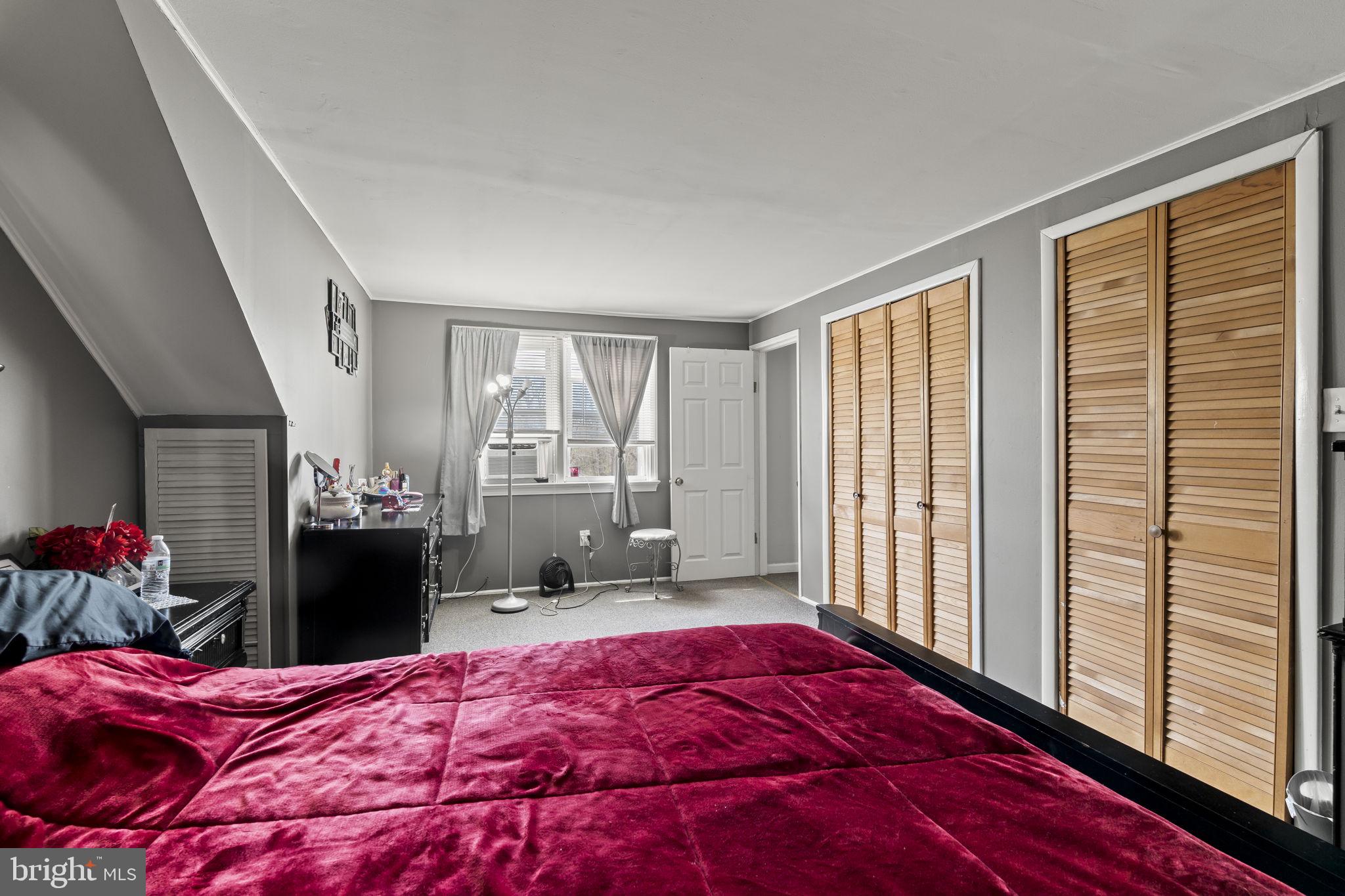 3105 Newportville Road Bristol, PA 19007 - Photo 19 of 30 a bedroom with a large bed and a window