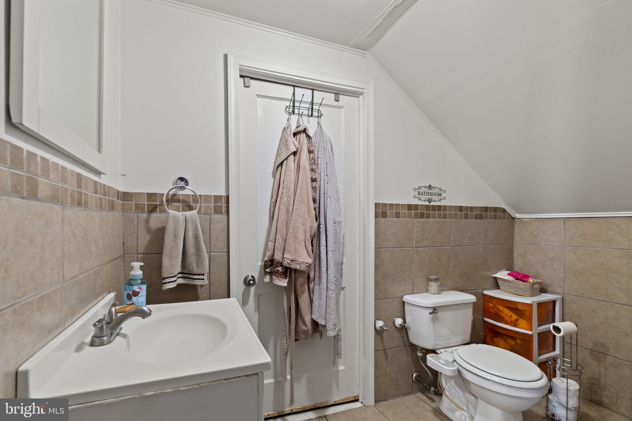 3105 Newportville Road Bristol, PA 19007 - Photo 20 of 30 a bathroom with a sink toilet and shower