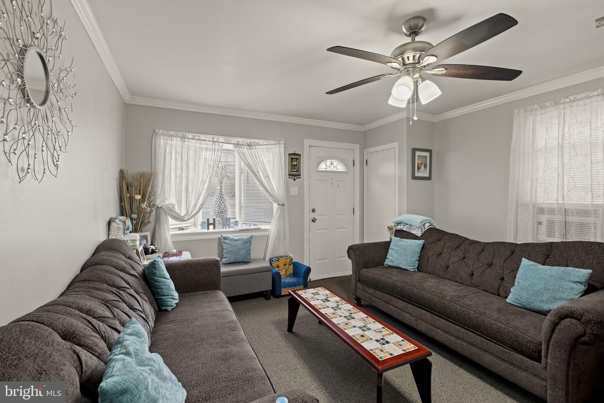 3105 Newportville Road Bristol, PA 19007 - Photo 4 of 30 a living room with furniture a ceiling fan and a window
