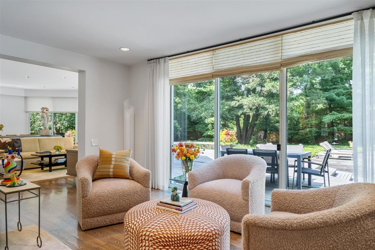 107 Woodley Road Winnetka, IL 60093 - Photo 8 of 56 a living room with furniture and a large window