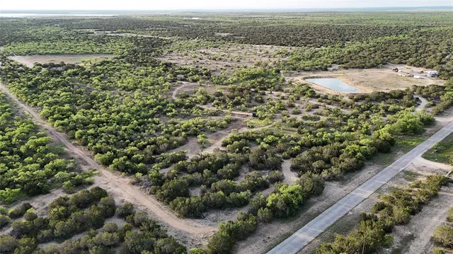 a view of a city with an ocean