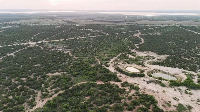a view of a yard with an outdoor space