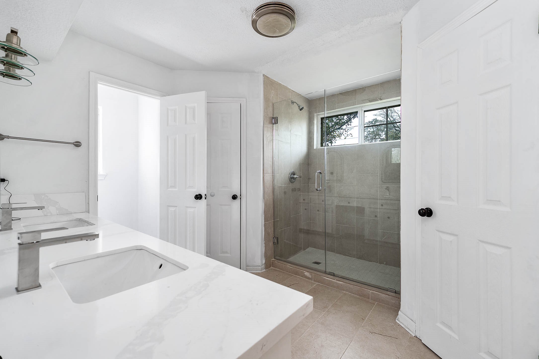 17627 Terrawren Lane Spring, TX 77379 - Photo 21 of 30 a bathroom with a shower sink and mirror