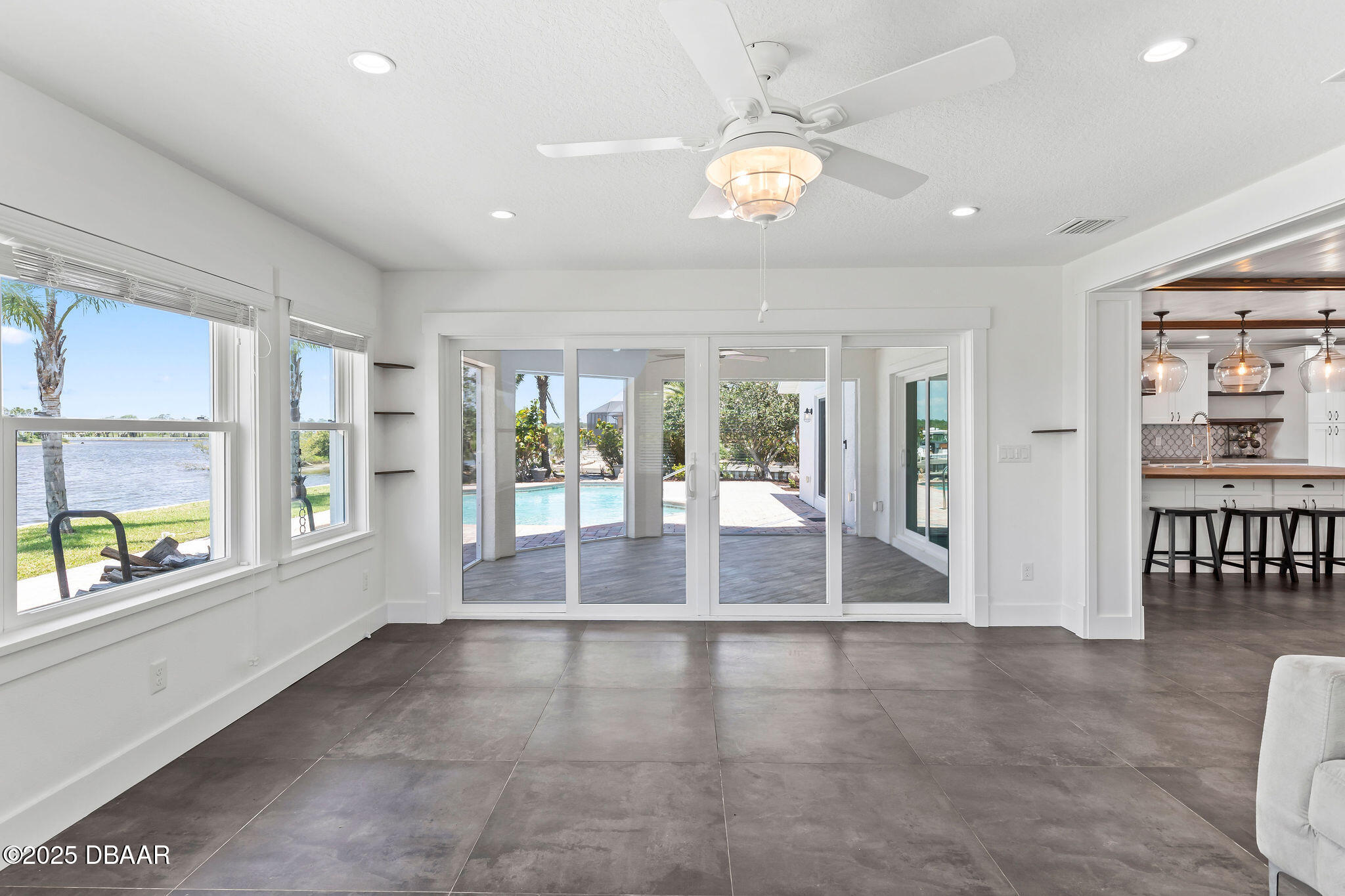604 Springdale Drive Flagler Beach, FL 32136 - Photo 20 of 78 a view of an entryway with wooden floor and door