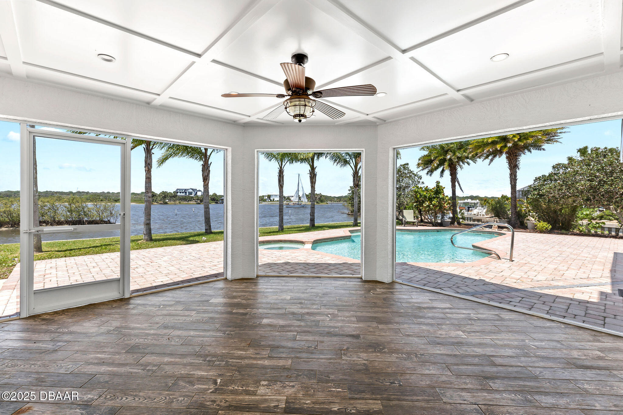 604 Springdale Drive Flagler Beach, FL 32136 - Photo 23 of 78 a view of an entryway with wooden floor