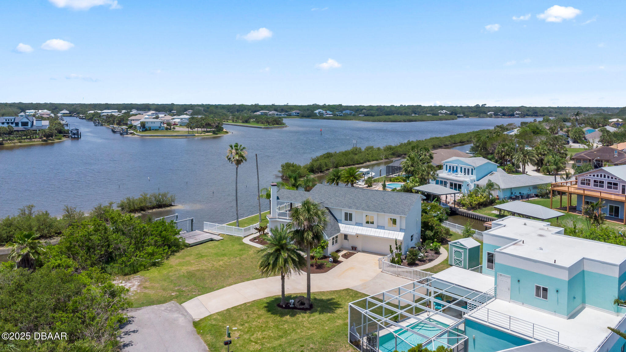 604 Springdale Drive Flagler Beach, FL 32136 - Photo 68 of 78 an aerial view of a house with outdoor space and lake view in back