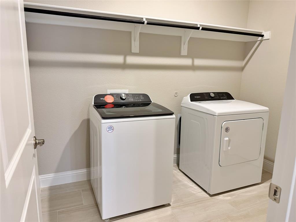 769 Poppy Lane Lavon, TX 75166 - Photo 27 of 32 a utility room with dryer and washer