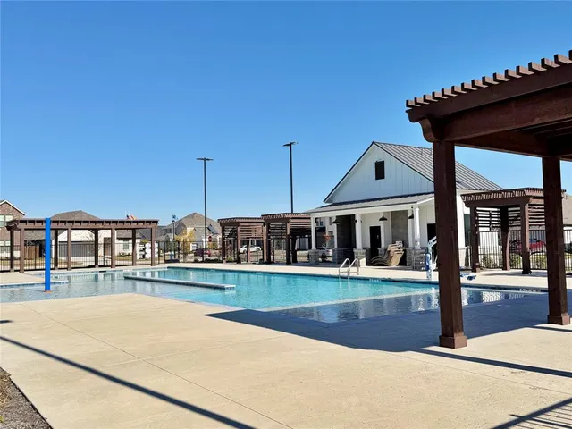 a view of a house with a swimming pool