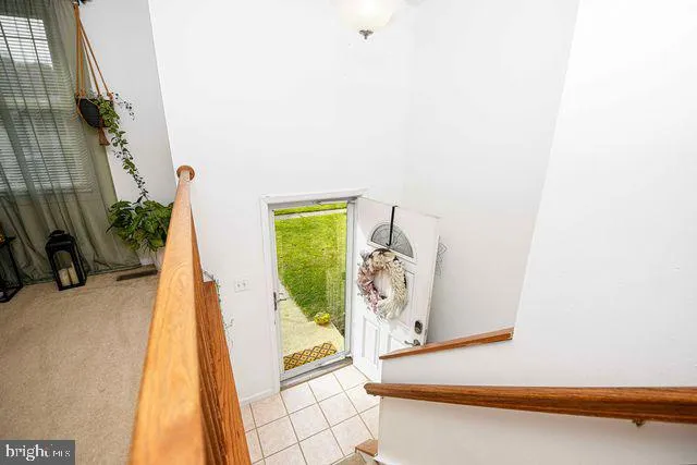 a view of a hallway with windows