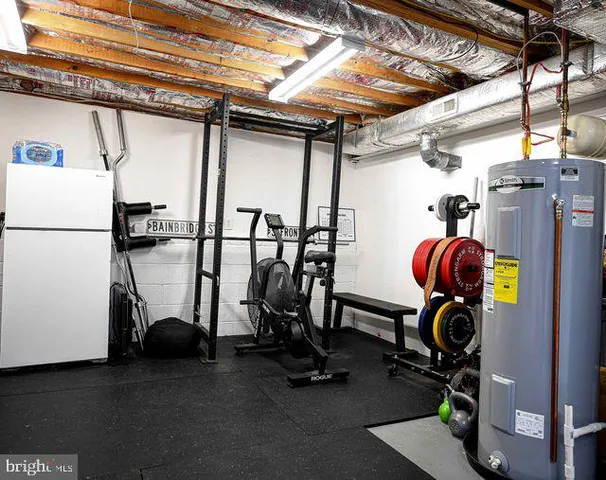 a view of balcony with furniture and umbrella