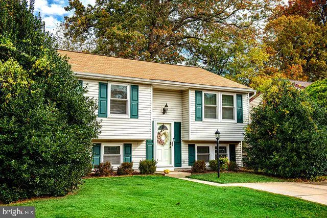 an aerial view of house with yard