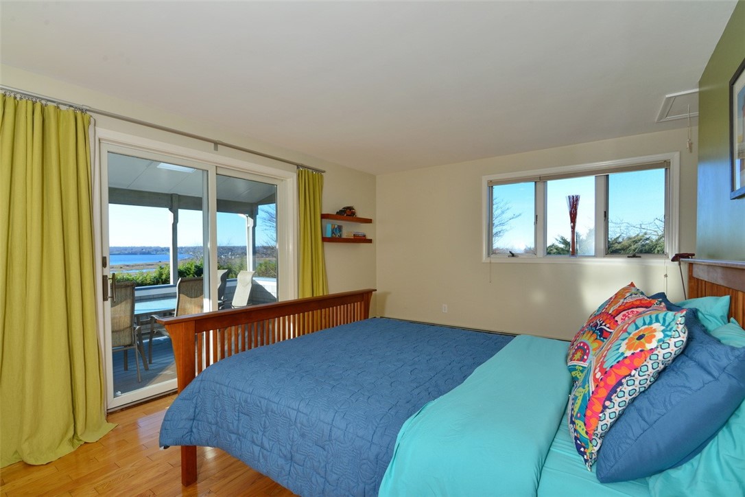 55 West Main Road Little Compton, RI 02837 - Photo 17 of 35 Primary bedroom with access to deck